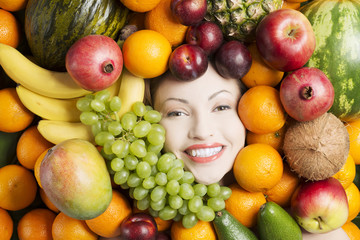 Woman face in fruits