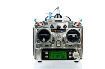 Remote control for helicopters and airplanes isolated on white