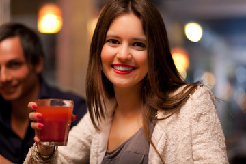 Woman holding a cocktail glass