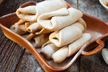 French sugar buns sprinkled with powdered sugar