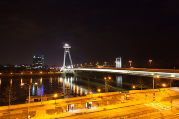 Night traffic on the bridge across the Dunai