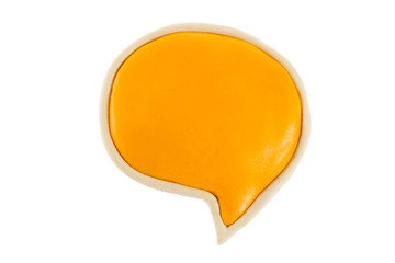 Yellow text bubble of plasticine on a white background