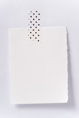 empty white paper note on the wall