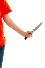 Die junge Frau h&auml;lt ein Messer in der Hand