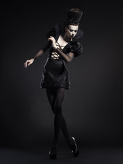 beautiful model posing as chess queen - fashion and beauty