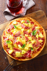 Delicious ham and pineapple pizza