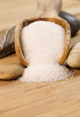Fototapeta na wymiar Coarse Salt in Wooden Spoon