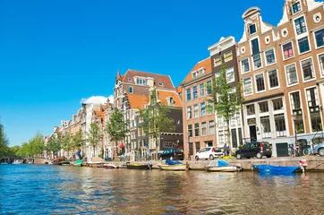 Tuinposter Amsterdam canals and typical houses with clear summer sky © Alexander Demyanenko