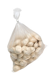 raw dumplings in a plastic cellophane bag