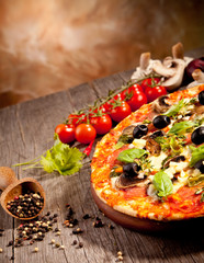 Delicious fresh pizza served on wooden table