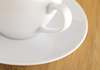 wooden table with white cup