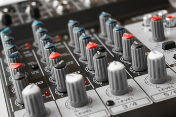 Detail of a music mixer in studio