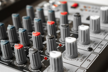 Detail of a music mixer in studio