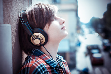 young hipster woman listening to music