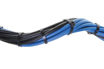 Blue and black electrical wires with cable ties