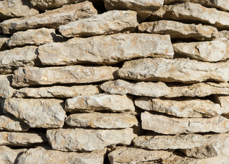 The old vintage stone wall