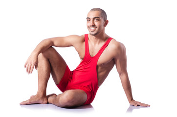 Young wrestler isolated on the white