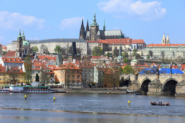 Obraz premium Spring Prague gothic Castle with Charles Bridge, Czech Republic