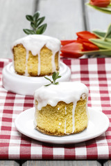 Glazed easter cake on squared table cloth