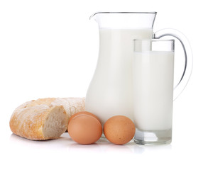Milk jug, glass, eggs and bread