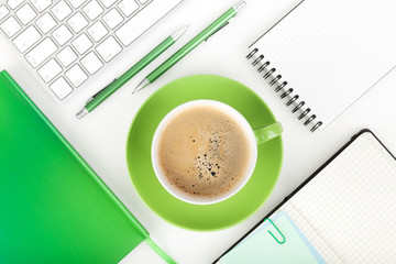 Coffee cup and office supplies