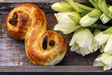 Traditional swedish buns. A saffron bun, in Swedish lussebulle o