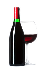 Bottle and a glass filled with wine
