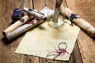 Message in bottle with a sealed message on old paper