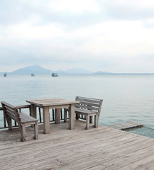 Fototapeta na wymiar table and chairs on a tropical beach resort