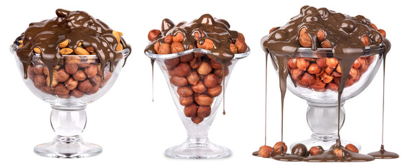 Chocolate Flowing over nuts in a glass  Isolated