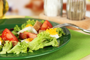 Fresh mixed salad with eggs, tomato, salad leaves and other