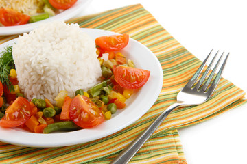 Delicious risotto with vegetables isolated on white