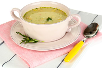Nourishing soup with vegetables in pan isolated on white