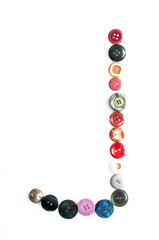 Letter alphabet formed of buttons