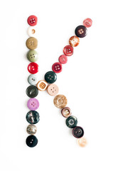 Letter alphabet formed of buttons