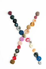 Letter alphabet formed of buttons