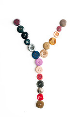 Letter alphabet formed of buttons