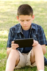 child with tablet