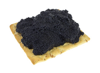 Cracker topped with caviar
