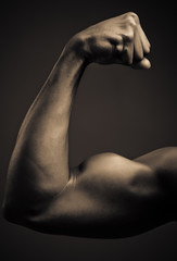 Young African American Man Flexing Biceps - 51876540