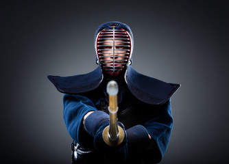 Portrait of kendo fighter with bokuto