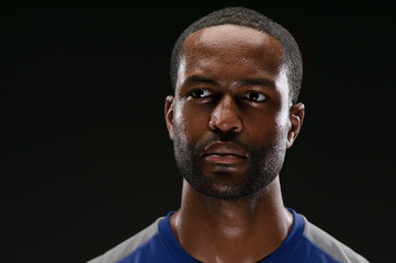 Fototapeta premium African American Athlete Portrait With Blank Expression