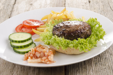 meatball with salad and french fries