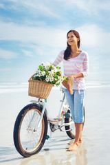 Obraz na płótnie Canvas bicycle flower woman