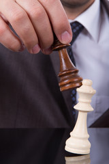 Businessman Holding King