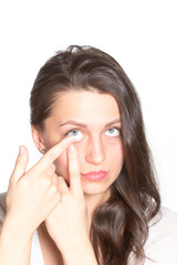 Fototapeta premium Young woman with contact lenses