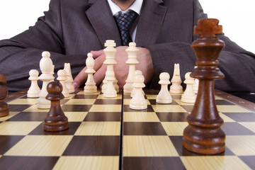 Businessman Thinking while Playing Chess