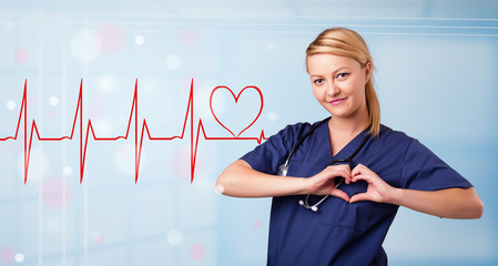 Young nurse listening to abstract pulse with red heart