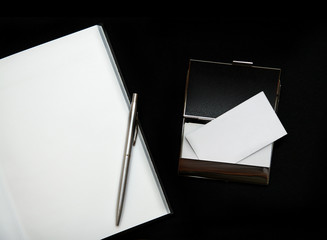Blank business cards and notebook