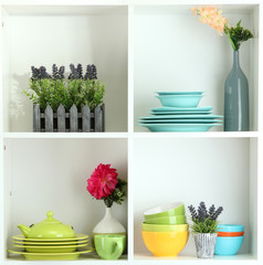 Beautiful white shelves with tableware and decor.